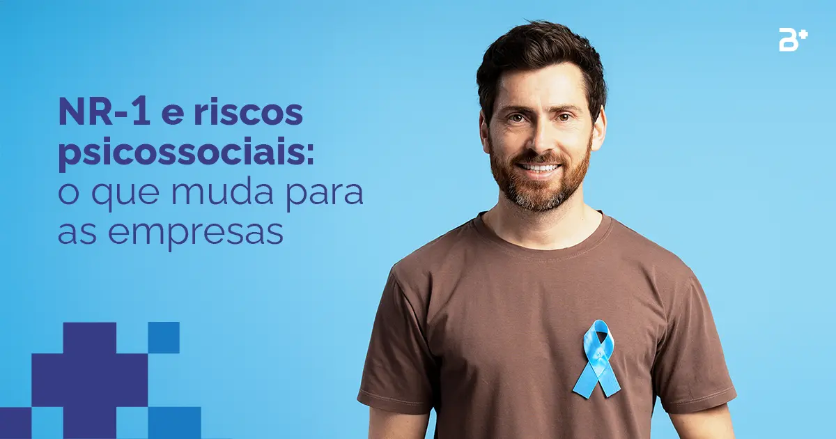 Novembro Azul com Propósito: de campanha para ação real. Homem olhando pra frente com uma camisa marrom e uma fitinha azul na camiseta.